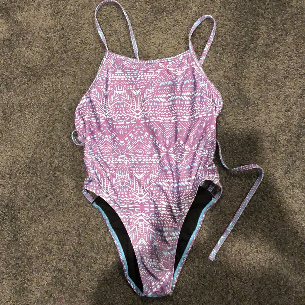 Size 30 Jolyn Gavin onesie in notorious print